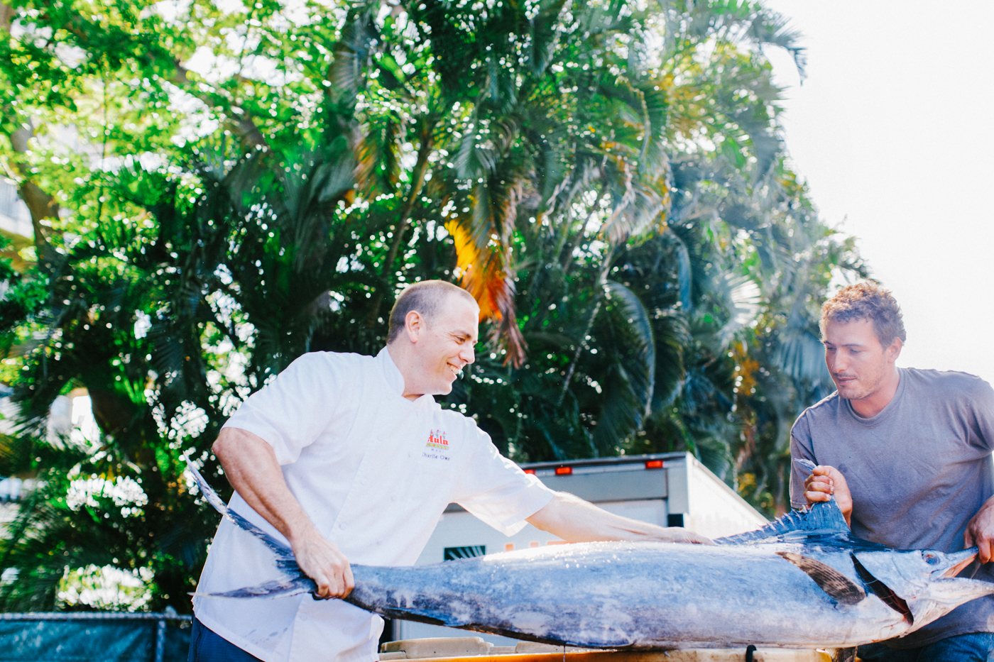 Two men with a giant fish