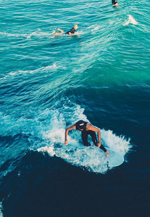 Surfers in tropical waters