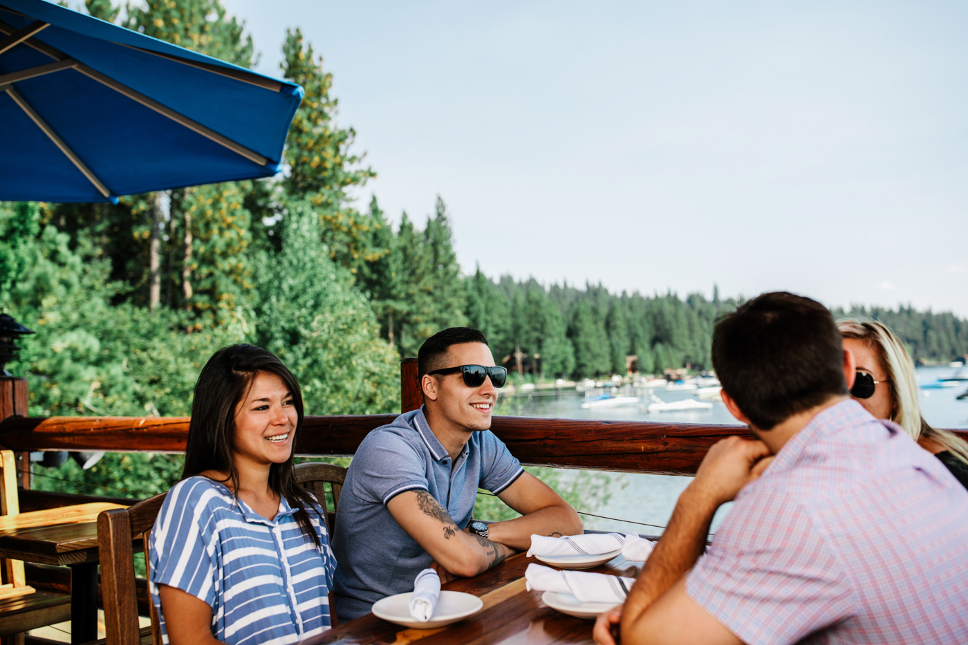 Friends eating on the lake